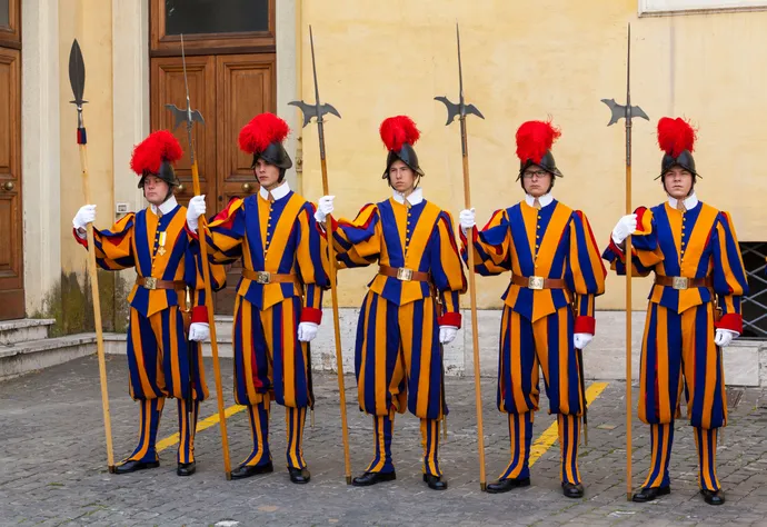 A line of Swiss guards in uniform at the Vatican