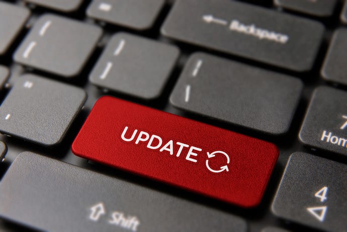 Keyboard with the word "update" on a red key