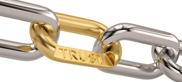 Image of interlinked chains with the word trust on middle link