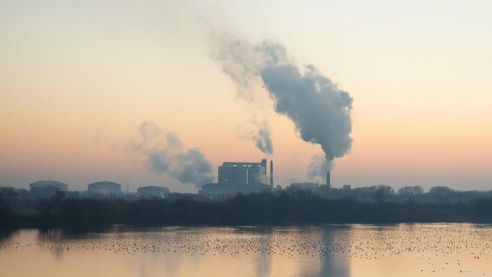 skyline with factories and smokestacks