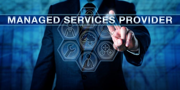 Man pressing finger against touchscreen interface with words managed service provider