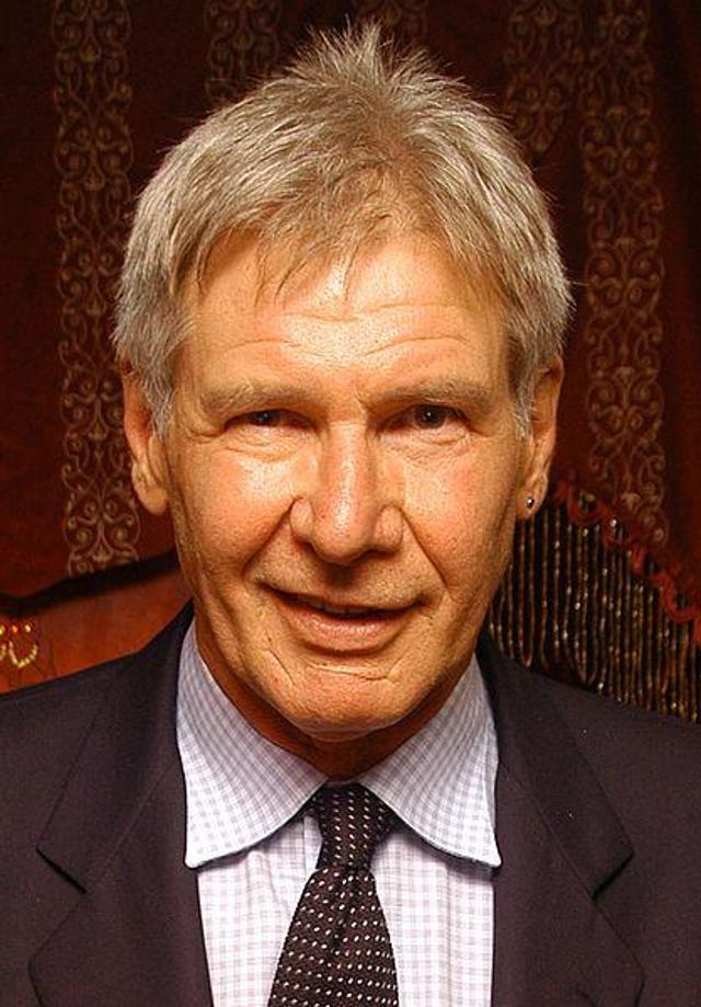 Harrison Ford smiles at the camera