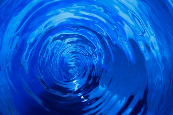 A blue water whirlpool