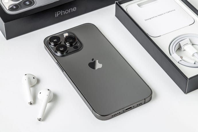 iPhone and AirPods on a desk