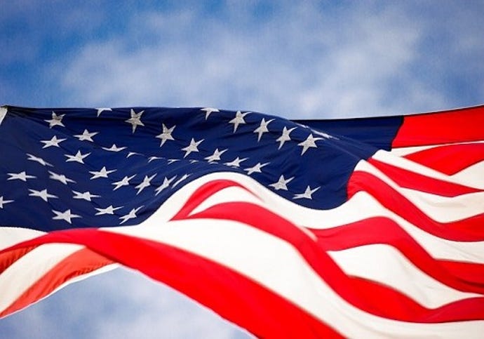 closeup of American flag waving in breeze