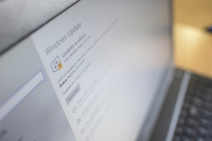 laptop screen  with Windows 10 security update note