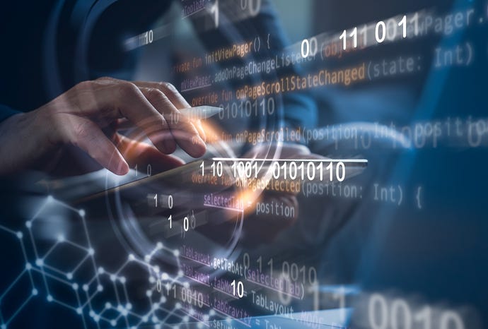 Hand reaching toward numbers on a screen