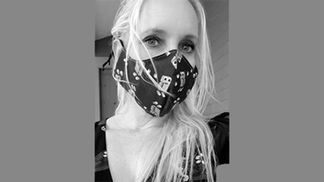 Lisa Hall, CISO of biotech research firm Color, has long blonde hair and a face mask