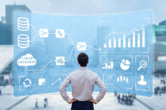 Man surveys illustrated screen of network diagram. Business Analytics and Data Management System (DMS)