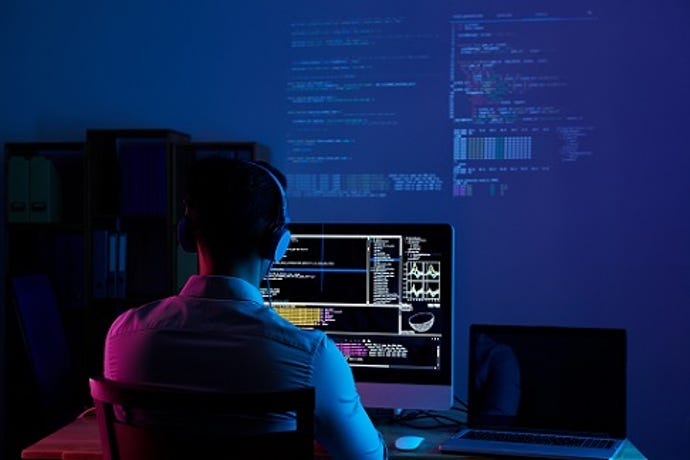 person looking at a back-end server