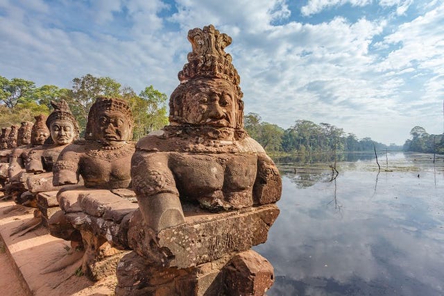 South gate of Angkor Thom along with a bridge of statues of gods and demons