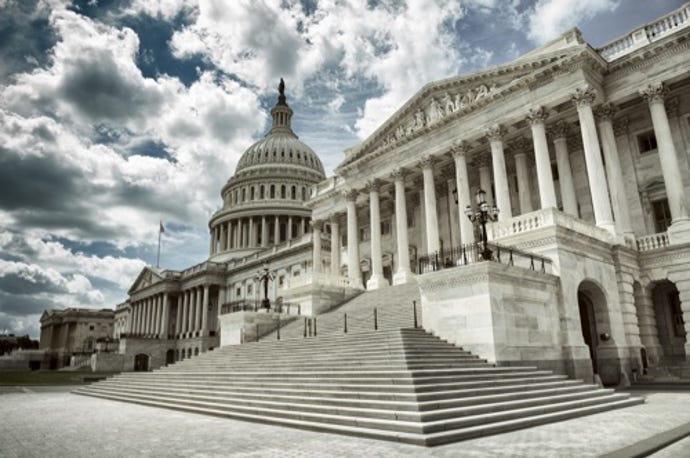 U.S. Capitol buildings under a cloudy sky