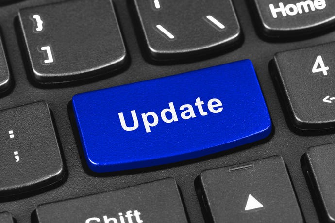 Image shows a blue computer keyboard button with the word "Update" on it