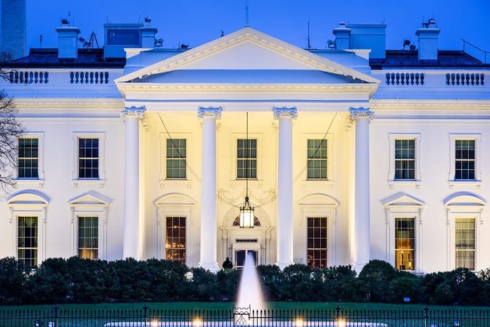 Photo of The White House in the evening