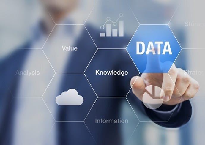 businesman pointing to data and value chart