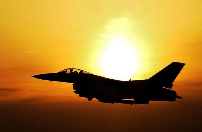 fighter plane in sunrise