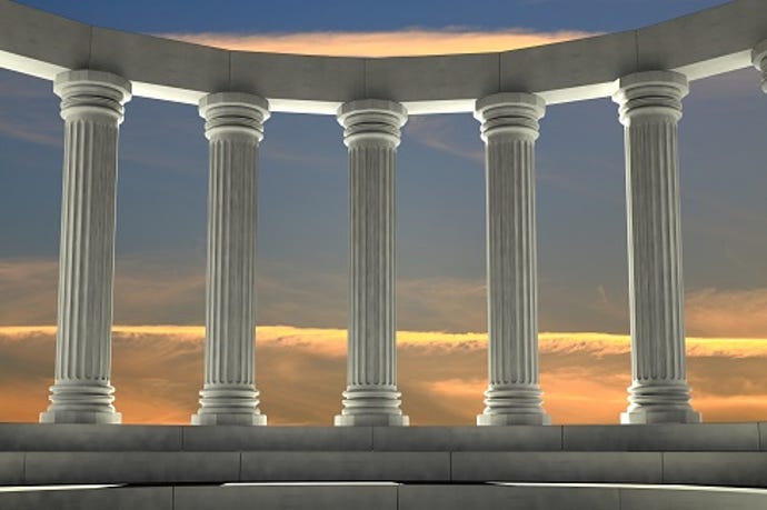 five columns with sunset in background