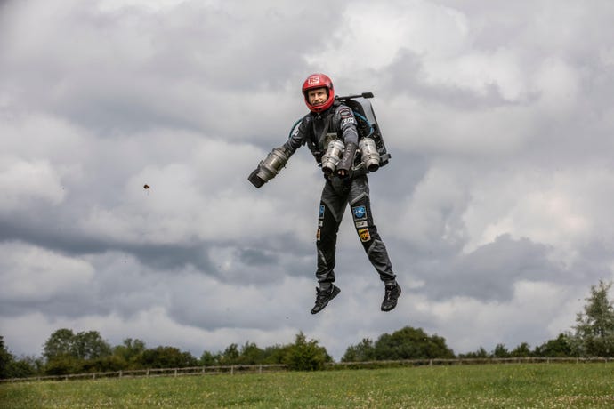Richard Browning in his jetpack drops in the village of Binley in North Wessex Downs