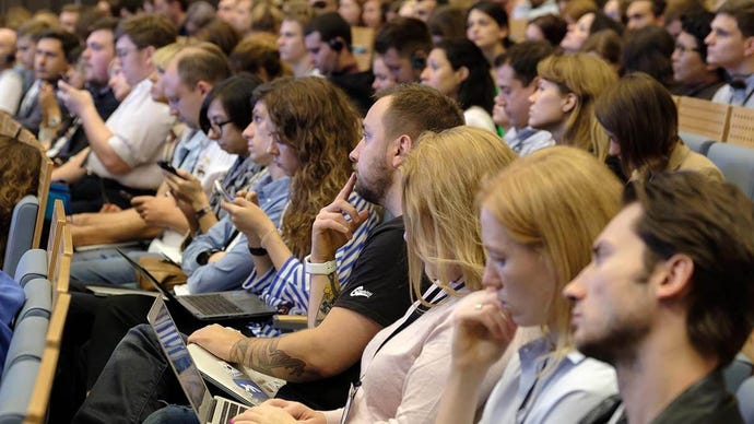 People attending industry conference