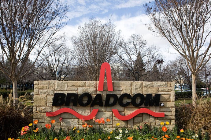 Photo of Broadcom sign, which is a sculpture of the logo mounted on a stone wall