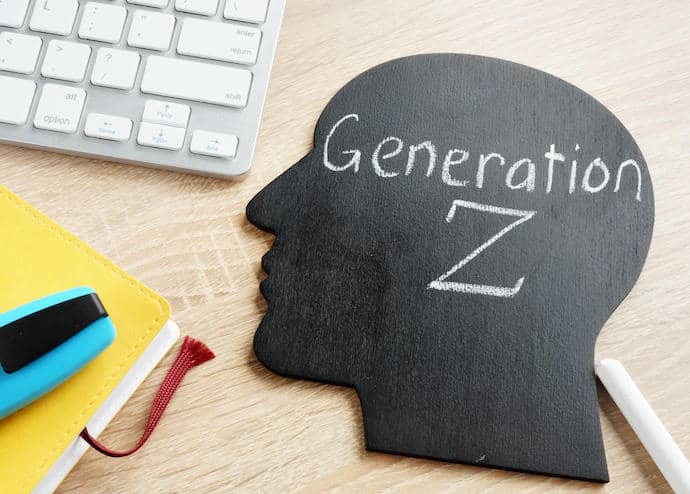 Generation Z written on a blackboard in the shape of a head.