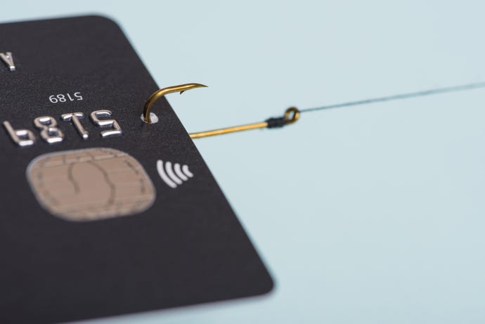 credit card caught by a lure to illustrate phishing