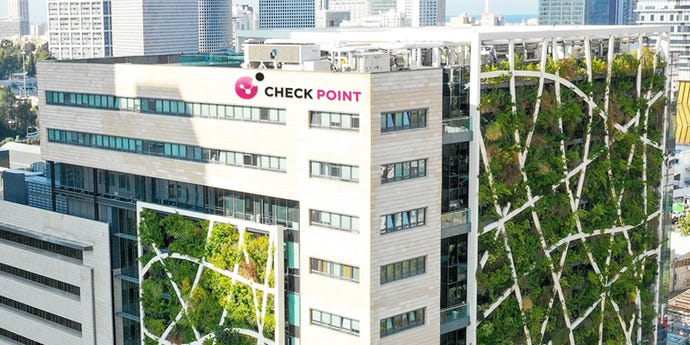 Photo of Check Point Software office building in Tel Aviv, with plant panels on the side and a sliver of ocean view at horizon