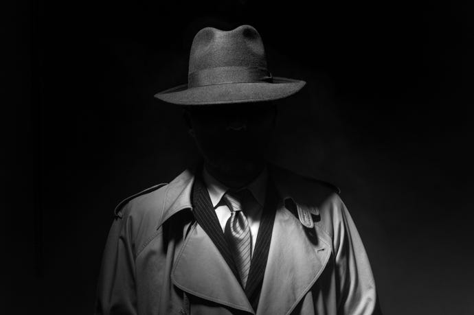 Picture of shadowy man in hat