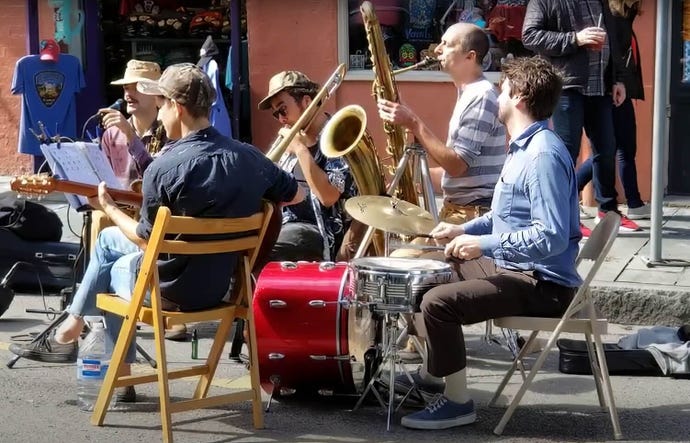 Jazz musicians performing in the French Quarter of New Orleans.