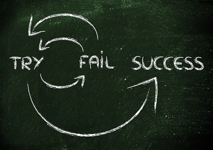 try fail success written on chalkboard