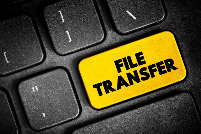 File Transfer - exchange of data files between computer systems, text concept button on keyboard