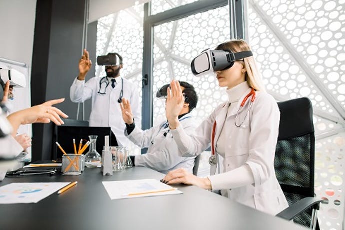 futuristic look at medical professionals using virtual reality goggles