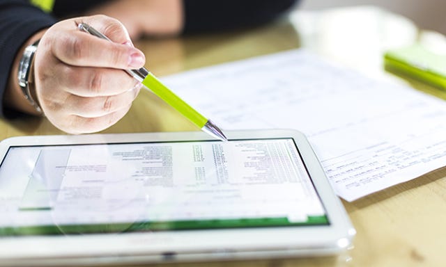 Accounting on a tablet computer, close-up