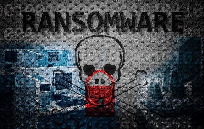 Image shows the word "ransomware" in black across the top with a skull and crossbones below with a red padlock over its mouth