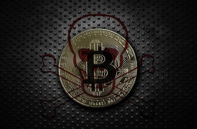 skull and crossbones over a Bitcoin, on a dark background, representing cyber attacks and cryptocurrency payment