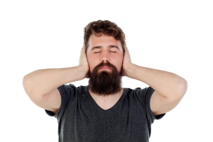 Man holding his head with headache