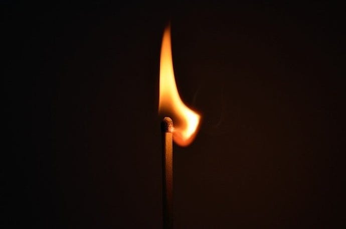 lighted single matchstick
