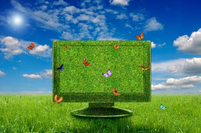 green technology concept with monitor and butterflies