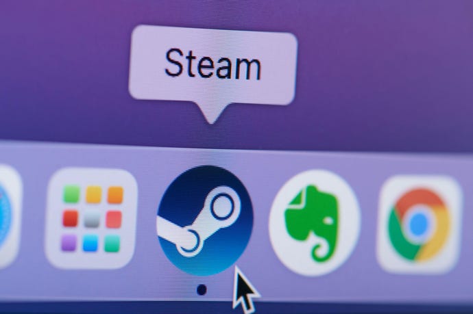 Click and open steam game platform on laptop screen macro close up view