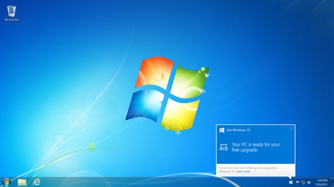 Windows 10 screen with notification to upgrade.