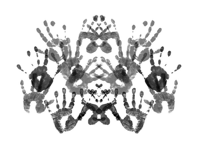 Mock Rorshach blot made out of hand images