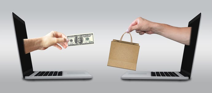 Business transaction--hands reaching out of computer screen