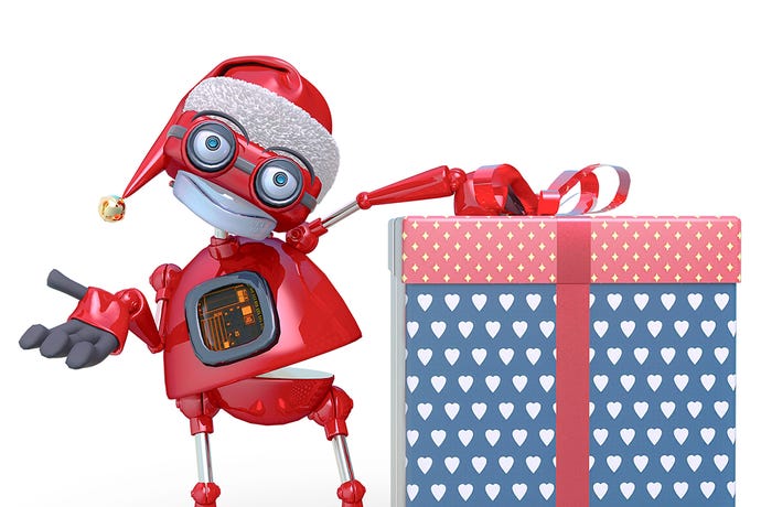 A red robot dressed in a Santa hat leans on a wrapped present and smiles