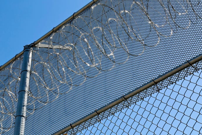 Barbed wire on a fence