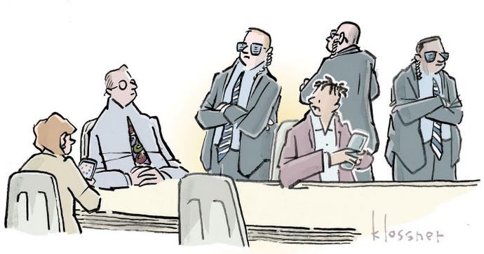 Caption contest: A businessman sitting at the head of the table looking like he's being interrogated by mean wearing sunglasses