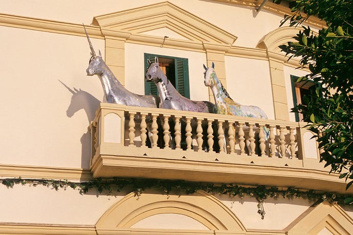 Photo of sculptures of two horses and a unicorn on a balcony in Port Andratx, Mallorca, Spain
