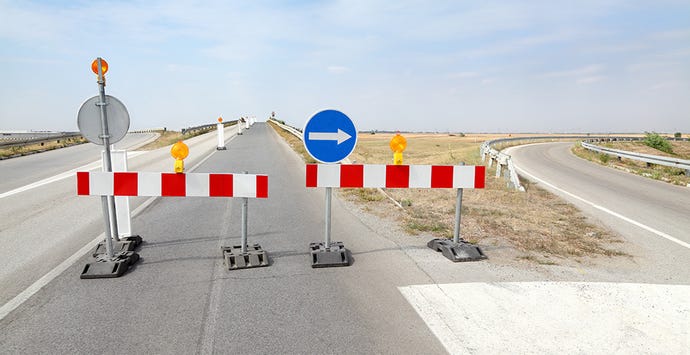 Photo of highway traffic being detoured.