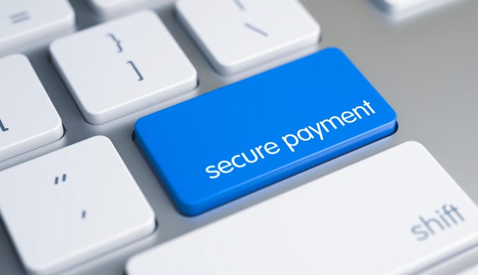 Computer keyboard button that reads "secure payment" to illustrate online payment fraud