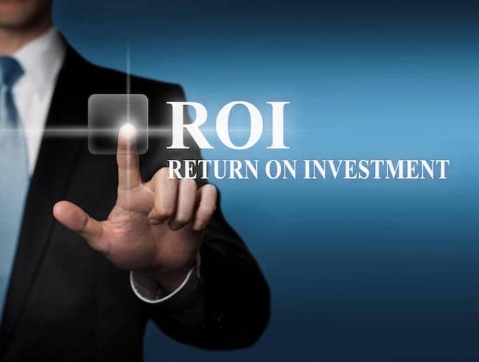 business concept - businessman in suit presses virtual touchscreen button - ROI Return On Investment