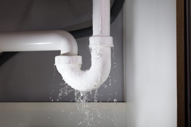 Close up of water leaking from a pipe